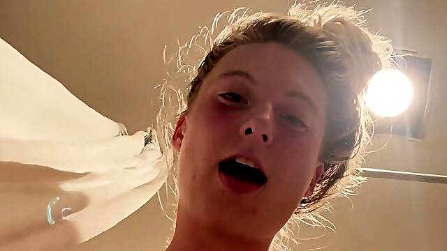 Brunette with glasses masturbates hairy pussy