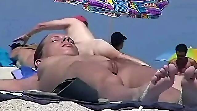 Two hot candid beach babes naked in the sun 2