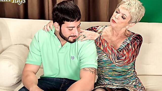 Short-haired mature Lin Boyde knows how to suck a big young cock