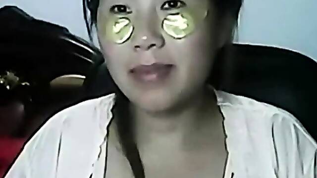 Wetting pussy of lonely Chinese MILF