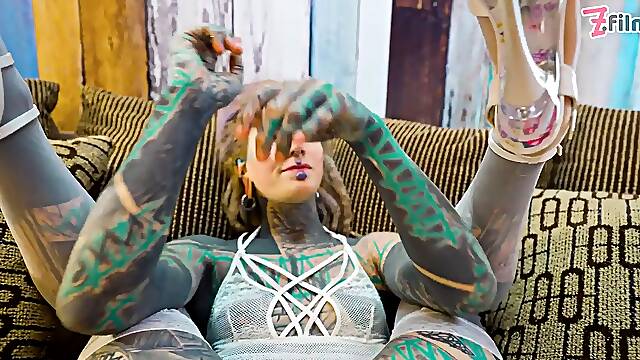 Tattooed assfucking goddess in white lingerie thumbs herself senseless