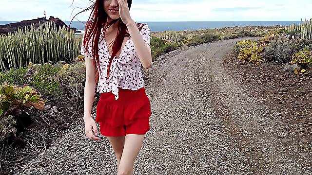 Lewd red haired babe Sherice is playing with stretched pussy labia and big clit