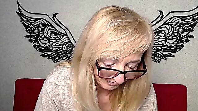 Blonde MILF with glasses on webcam