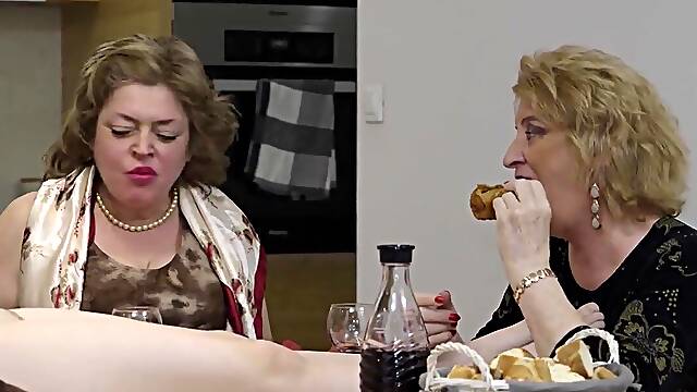 Multiple older women are playing with one lesbian teen