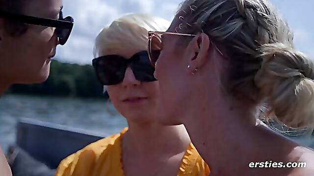 Horny girls are having a lesbian orgy in the boat, in the middle of the day