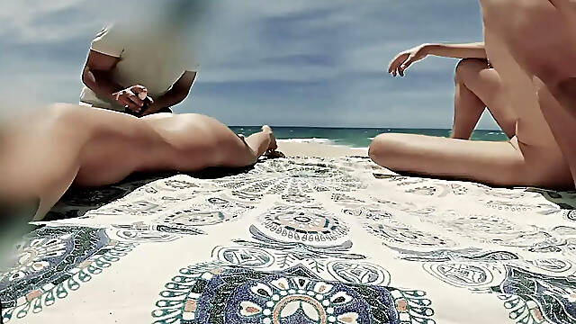 Stranger flashes his cock while creaming my wife at the beach