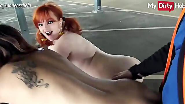 Redhead German amateur gets a big dick in public parking lot