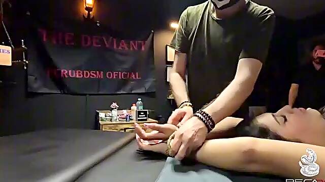 Bitch is tied up and sodomized by her master, and fucked by his apprentice