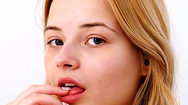 Chubby blonde teen Bianca Bell fingers her meaty pussy