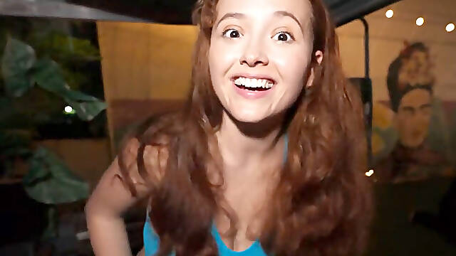 Attractive redhead with a shaved pussy riding in public