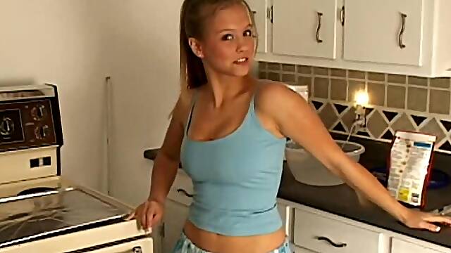 Foxy cowgirl goes topless while baking in the kitchen