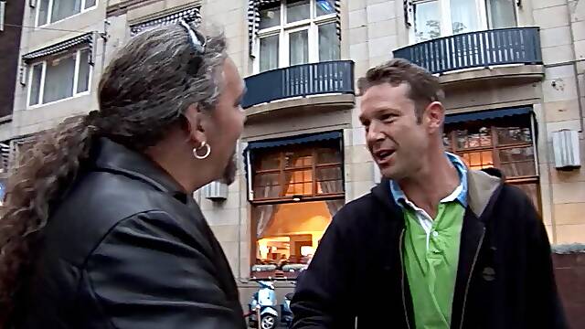 In the red light district of Amsterdam he finds and fucks a hooker