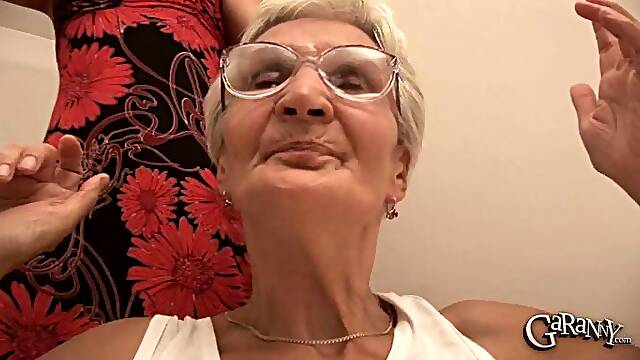 Elderly chick Elizabet handles a couple of pulsating boners