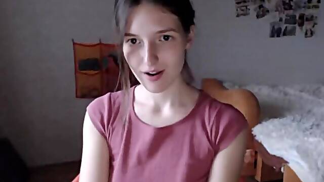 Horny brunette teen masturbating with a toy