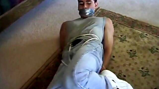 Eric Estevez is tied in the room waiting for a new sex experience