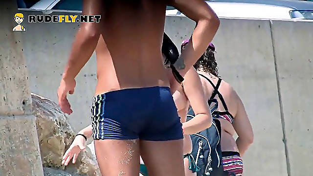 Bare teen naturist lets the water smooch her body