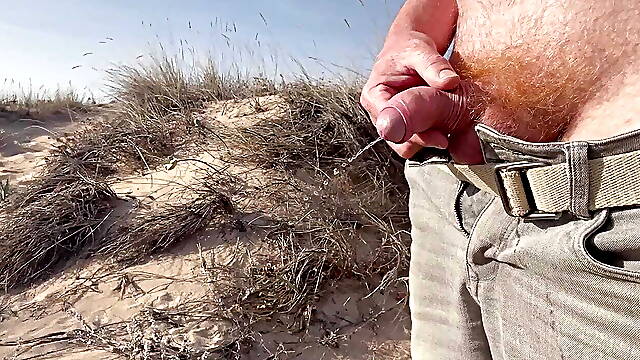 Big ginger cock pissing in the dunes at the beach and in a bar