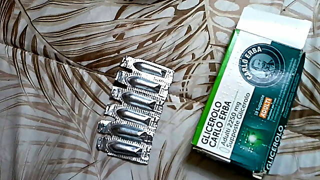 Glycerin suppositories pushed in the ass with a vibrator