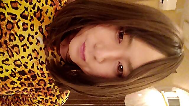 Japanese crossdresses wearing leopard Morphsuit