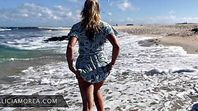 Blonde slutwife shows off to strangers nude and exposed on public beach