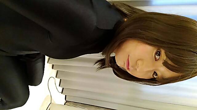 A cross-dressing boy changes from a female panther costume to black full-body tights