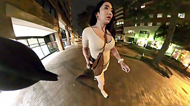 Kelly goes for a walk downtown in a tight slutty dress