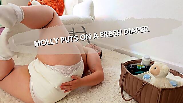 Molly Changes Into A Fresh Diaper
