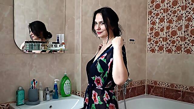 Busty hairy bush mature takes a soapy shower